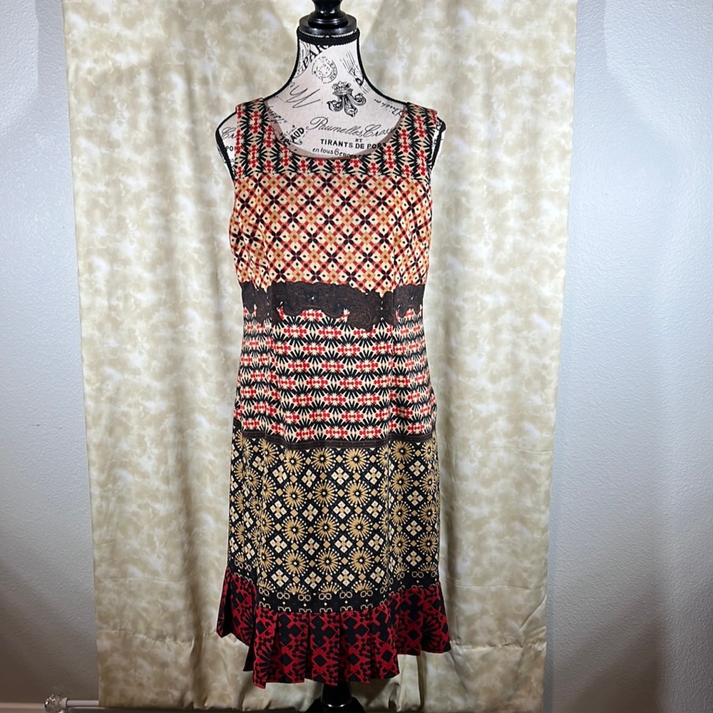 Danny & Nicole multi design sleeveless dress. With matching short sleeve jacket.
